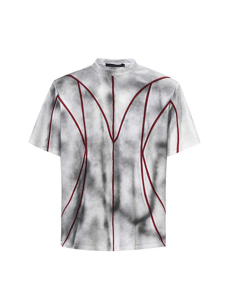 Padded shoulder short sleeve t-shirt with textured line patchwork design and round neck.