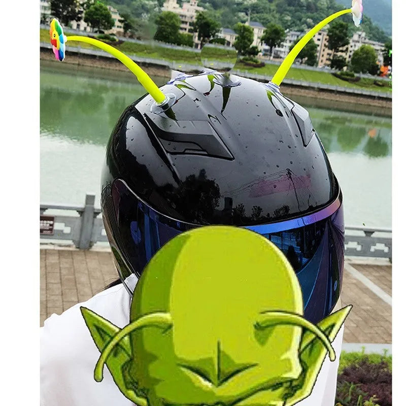Yellow silicone sunflower helmet decoration with a suction cup mount on a helmet.