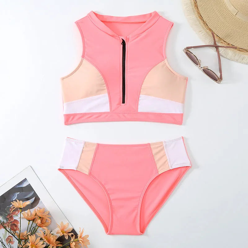 Pink high waist bikini swimsuit set with briefs and a bra on a mannequin.
