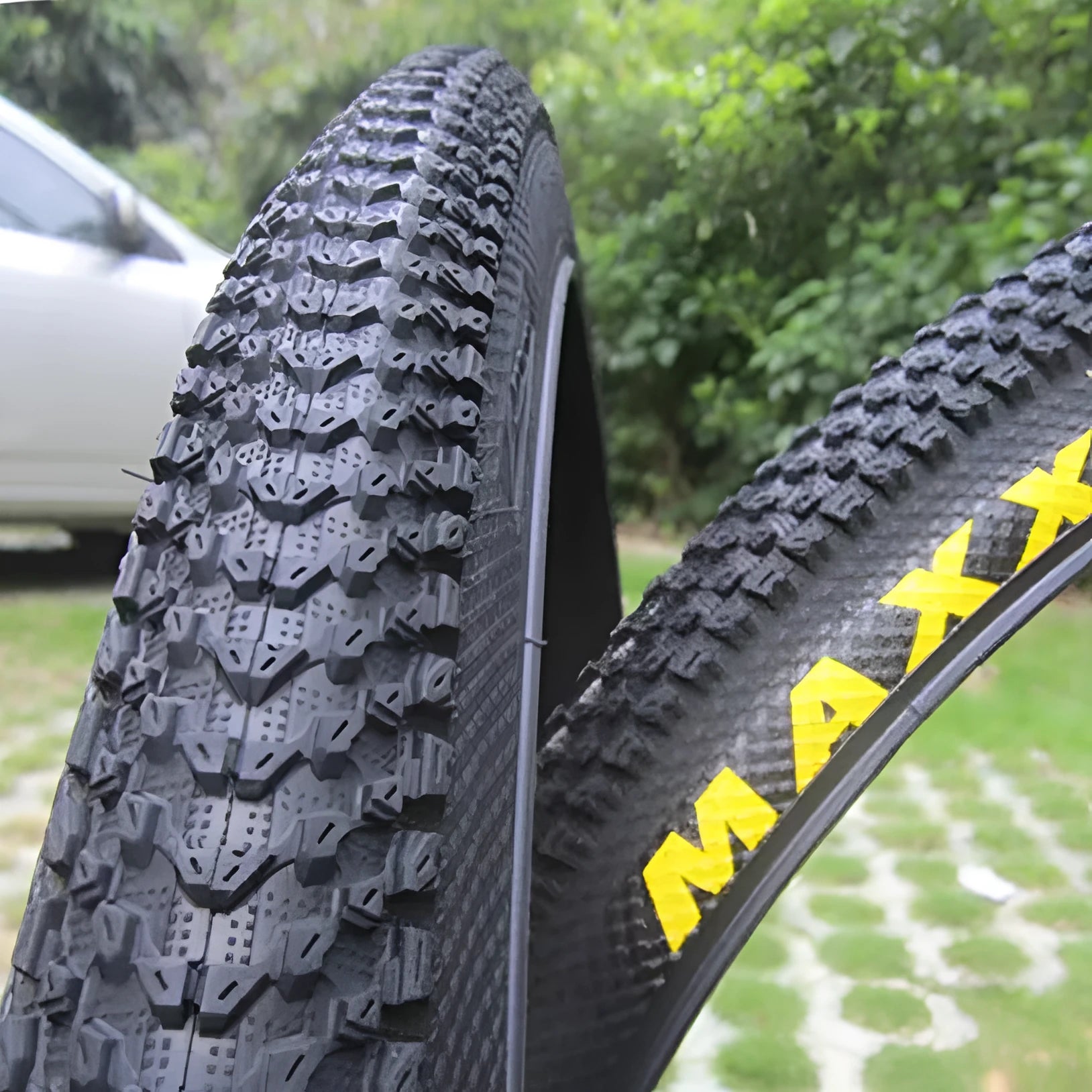Ultralight mountain bike puncture proof tyre showing tread and available in multiple wheel sizes