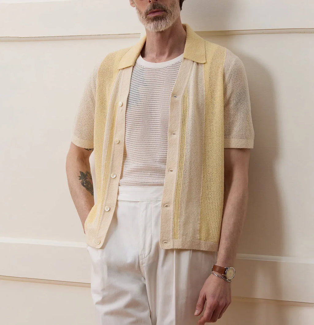 Hollow-out short-sleeved Tencel polo shirt in yellow with asymmetric design