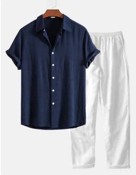 Casual loose fit short sleeve suit set in cotton linen blend, shown in navy blue colour with included glasses, shoes, and watch.