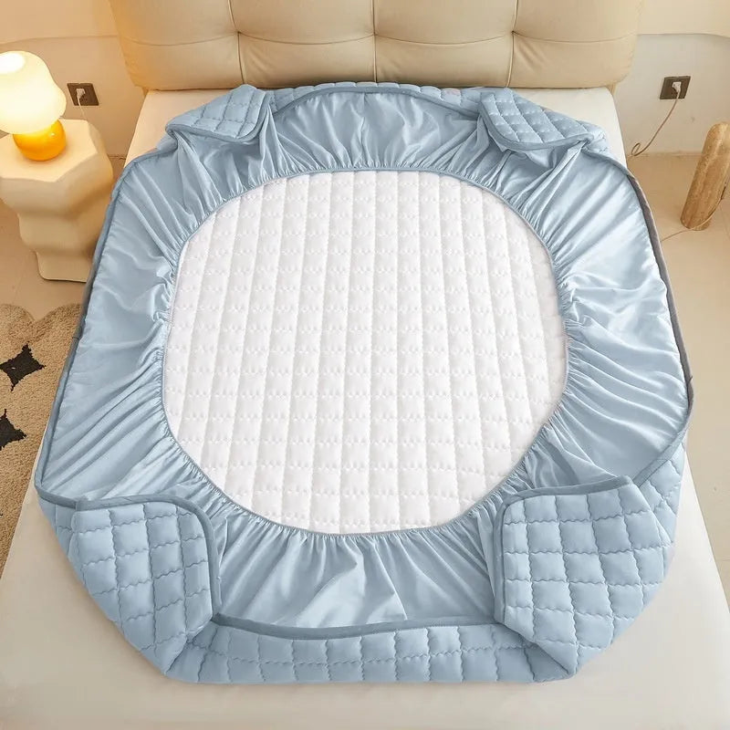 Class A waterproof fitted sheet in blue, shown stretched over a mattress corner.