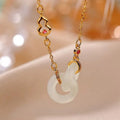 Gold-plated copper necklace with natural Hetian Jade gourd pendant on adjustable cross chain 41-50cm