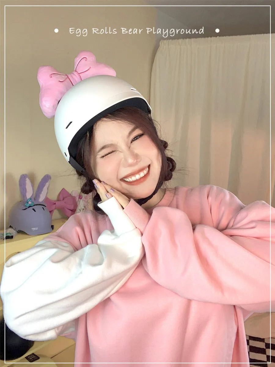 Plush bow helmet decoration in red, peach pink and rose pink colours for motorcycle and ski helmets