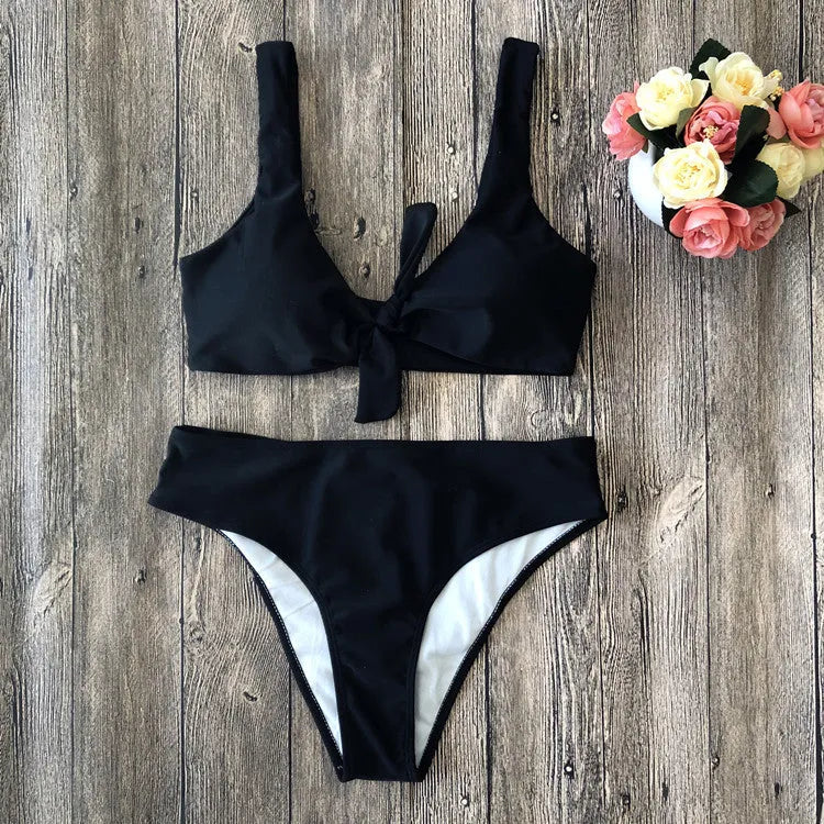Solid colour polyester bikini swimsuit set on a white background