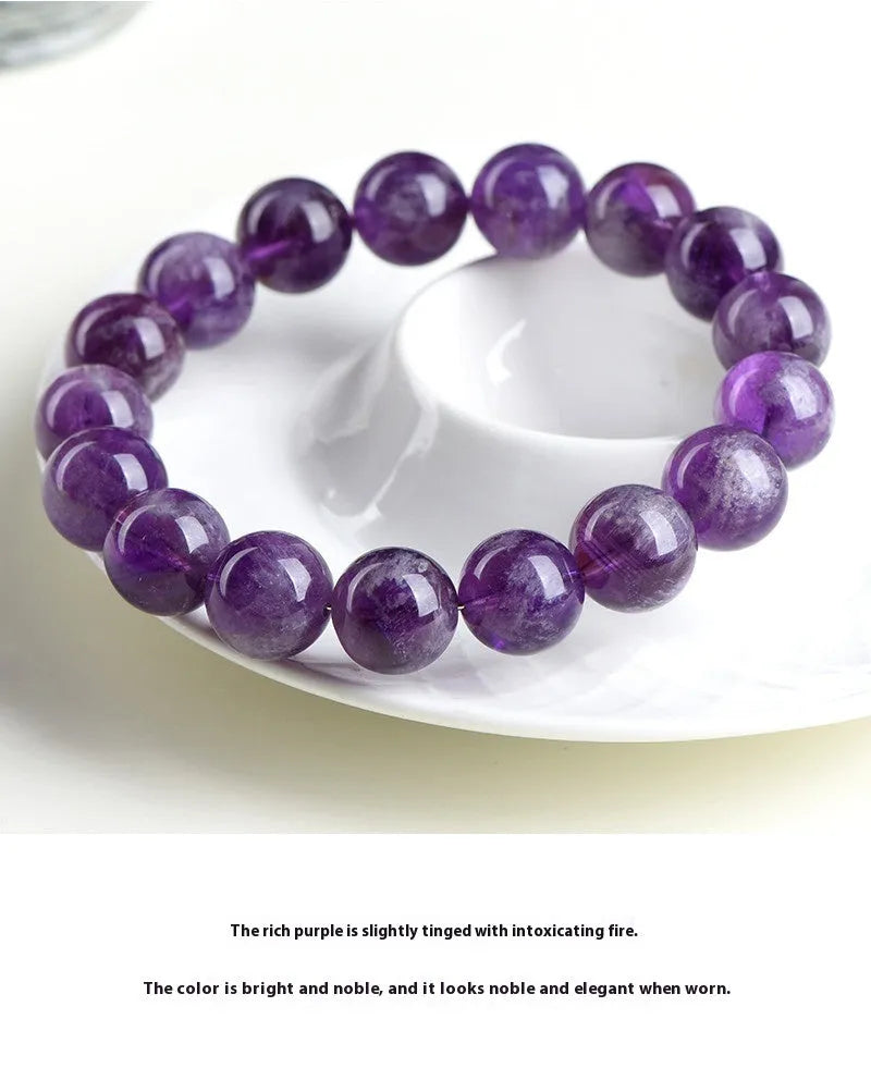 Natural Feather Amethyst bracelet with scattered beads in Snow Mountain purple colour on white background