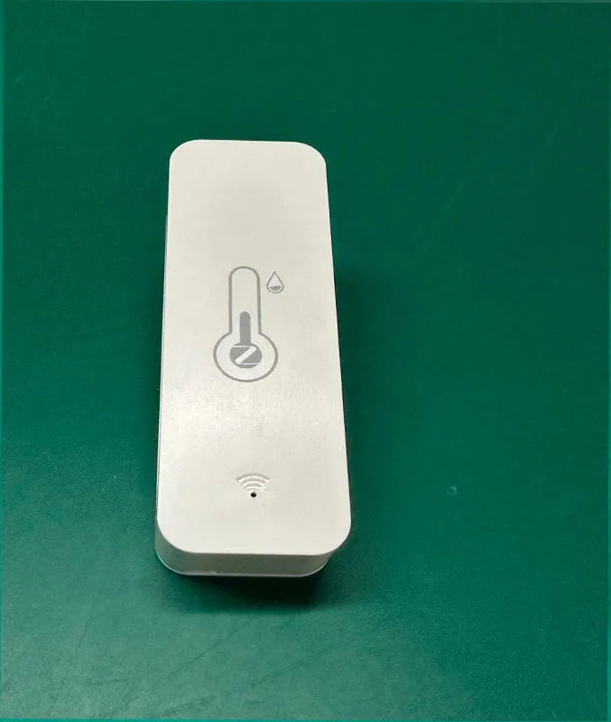 WiFi temperature humidity sensor with Tuya Zigbee connectivity in compact ABS housing