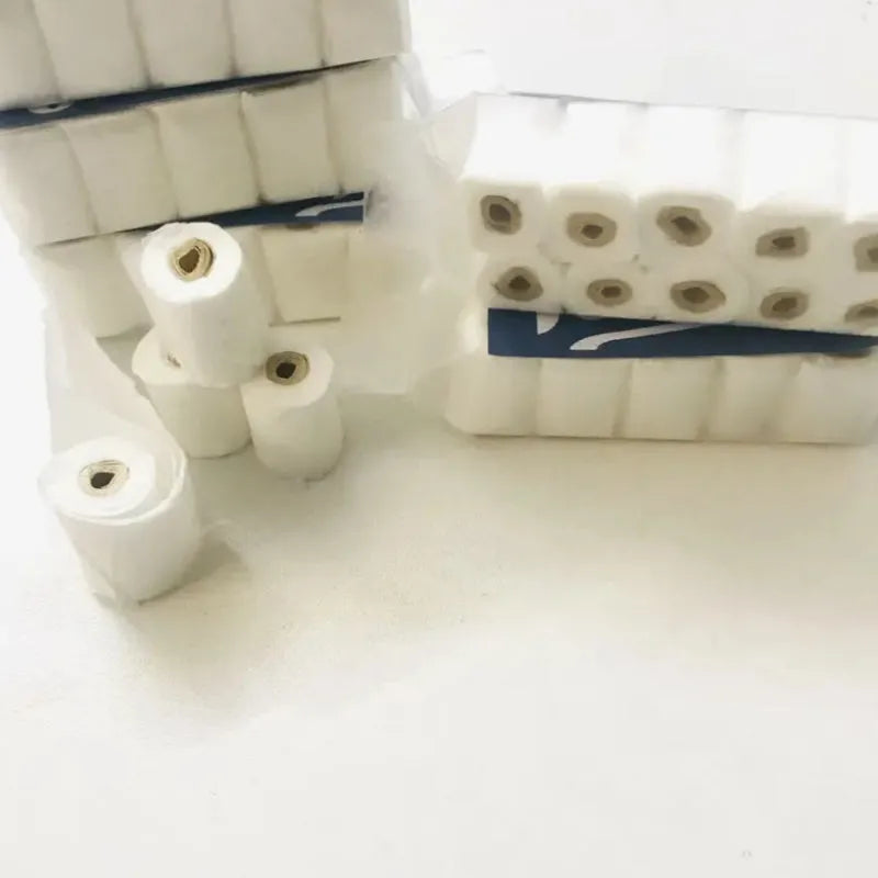 Miniature simulated paper toilet paper roll model for childrens play, dimensions 30mm by 15mm by 80mm.
