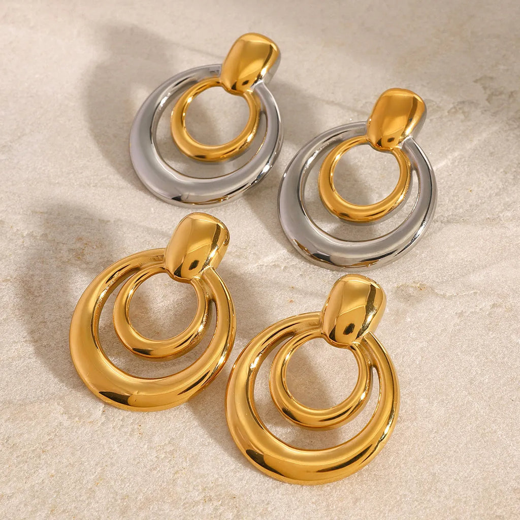 Round double layer hollow stud earrings with geometric design and 18K gold plated finish