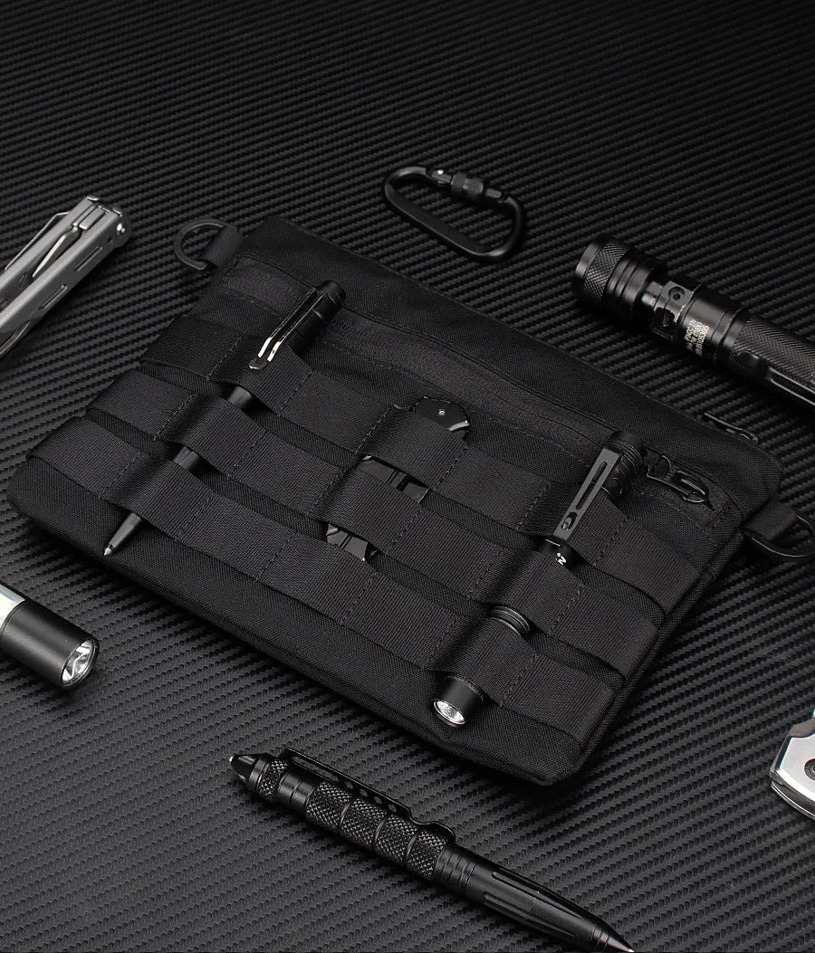 Black oxford cloth outdoor kit bag measuring 18cm by 3.5cm