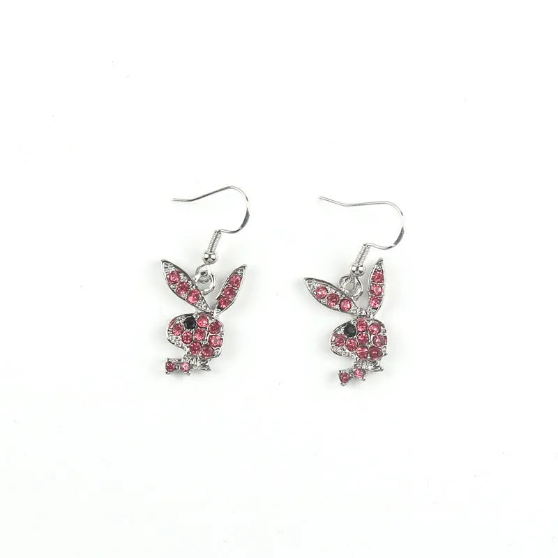 Rabbit stud earrings with diamond sparkle in silver, pink, and gold colours.