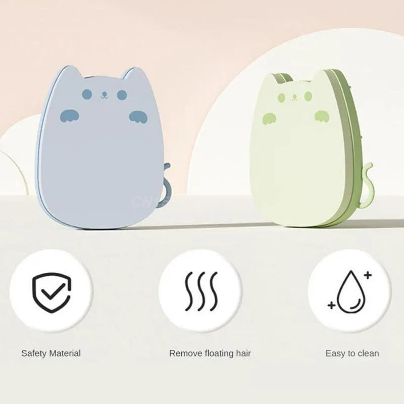 Blue silicone pet comb with sponge head for static adsorption of cat and dog hair.