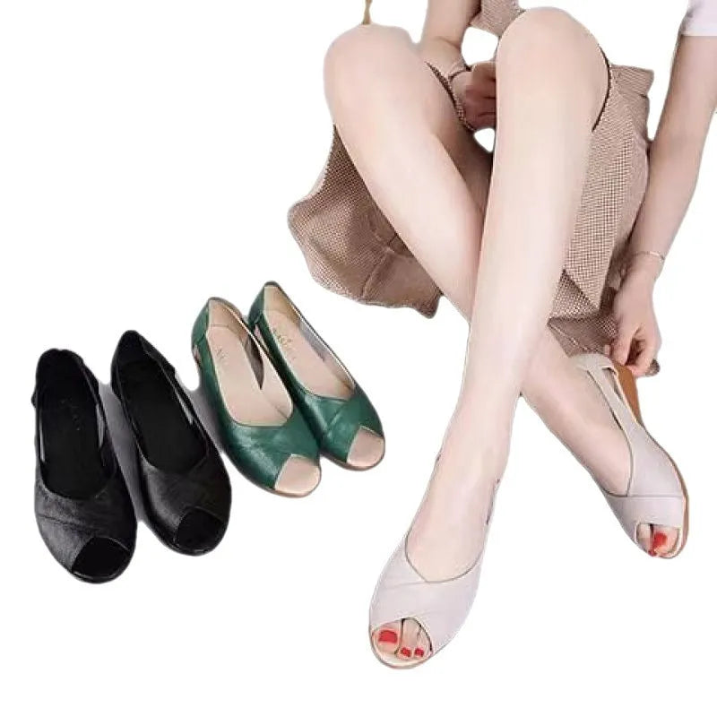 Women's peep toe rubber mid heel sandals with ankle buckle in black, side view