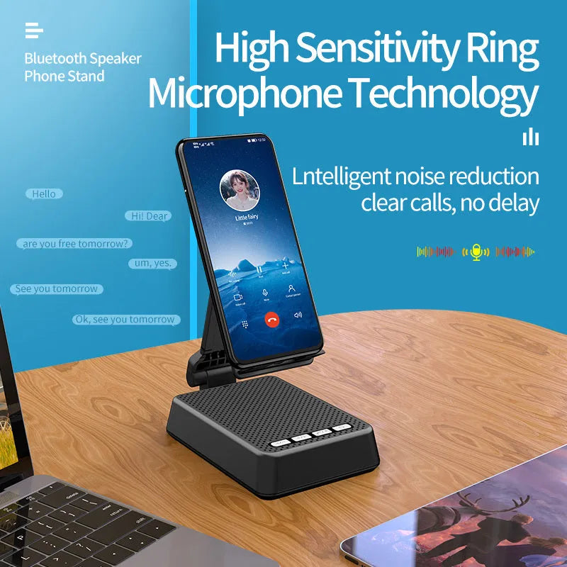 Black mobile phone broadcaster stand with Bluetooth speaker and microphone on a desk