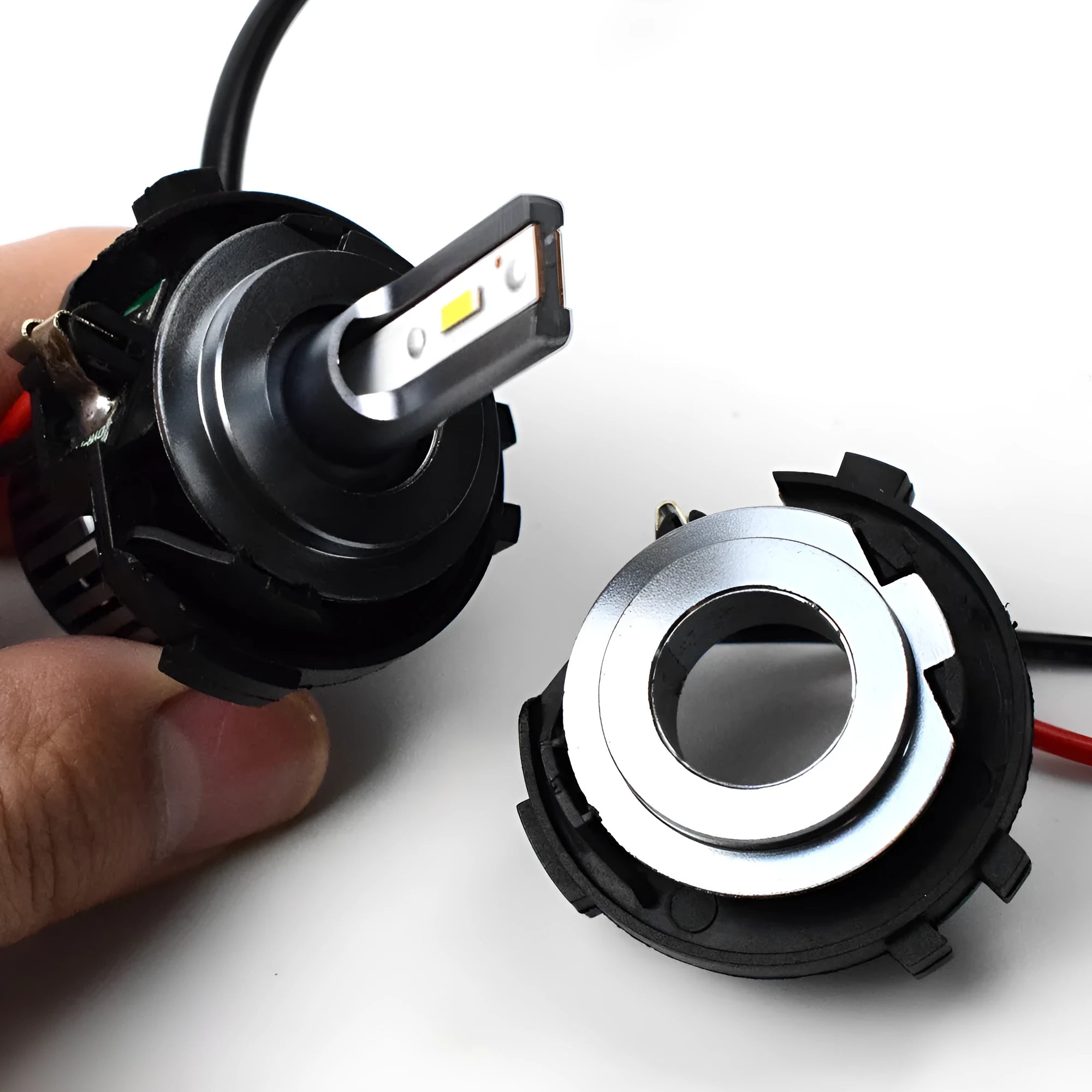 Black H7 LED headlight adapter bracket for Volkswagen Golf and Jetta vehicles