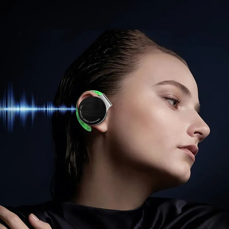 Black and white wireless sports Bluetooth earphones with 15m range showing ear plug design