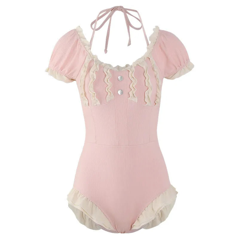 Pink conservative one-piece swimsuit for women in traditional Siamese cut design