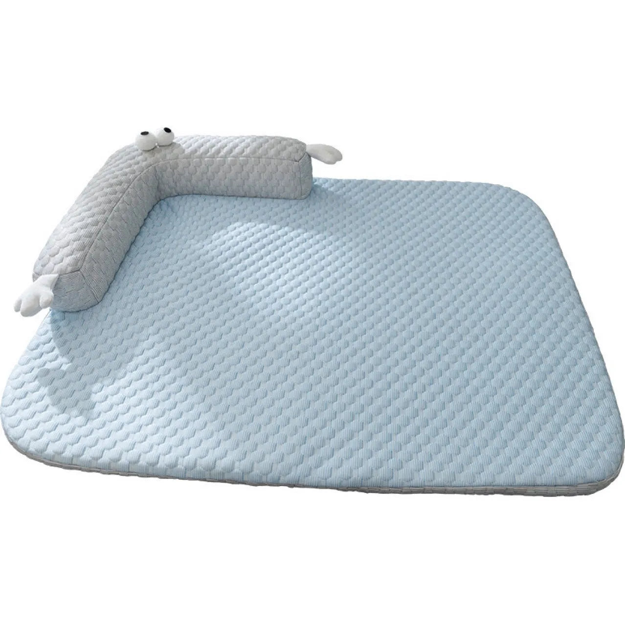 Blue big-eyed monster design breathable pet cooling bed for dogs and cats on a wooden floor.