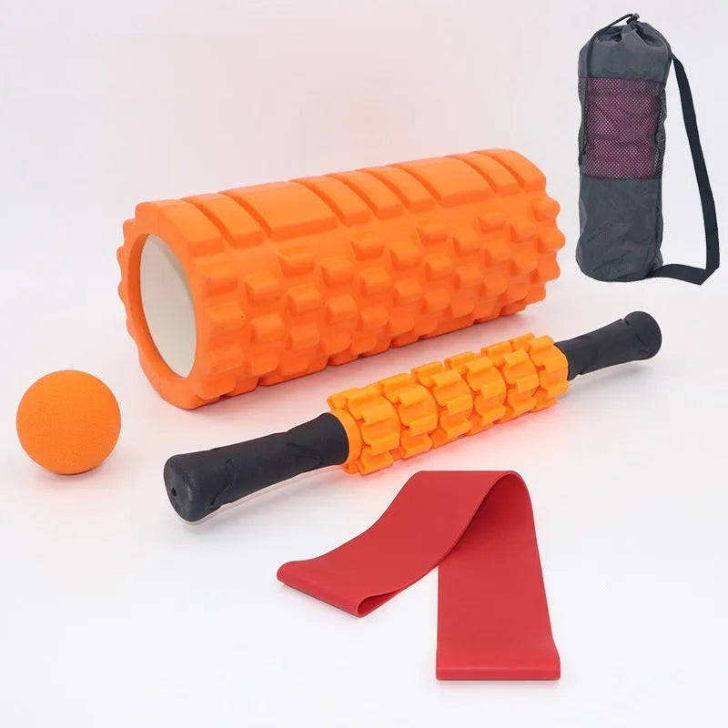 Black foam roller massage bar with gear-like segments, measuring 33cm in length