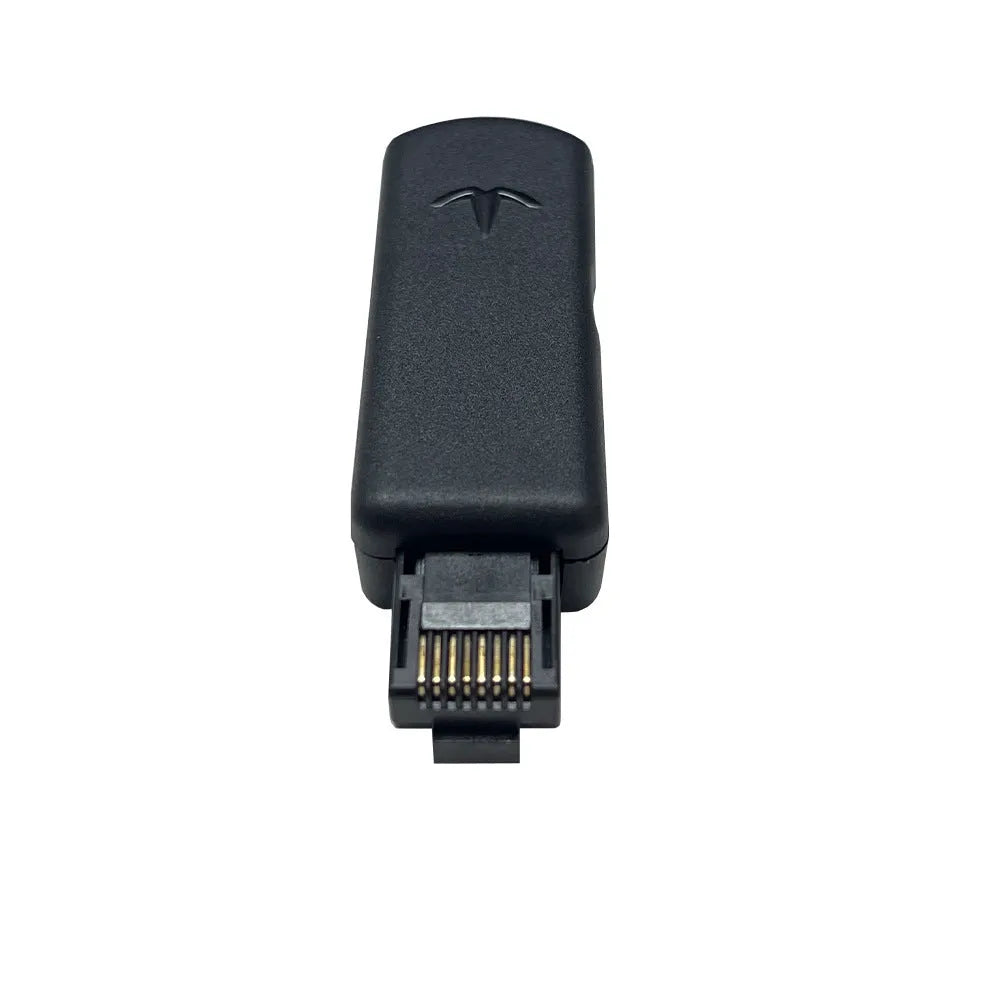 Black JB Tool USB adapter for PlayStation 4 with Ethernet port, shown with data cable.