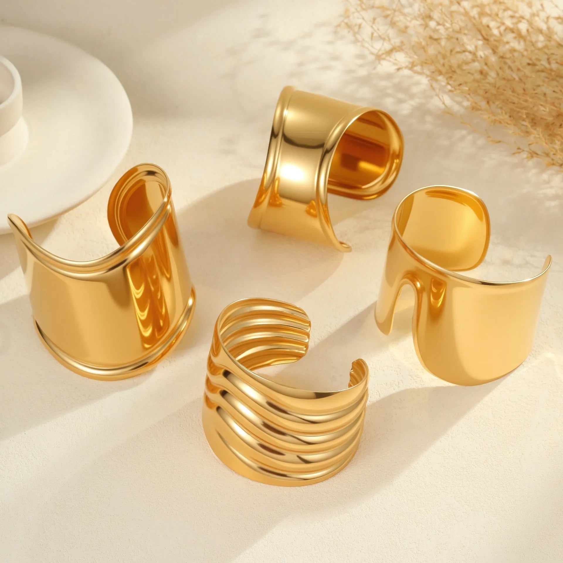Women's wide geometric wave bracelet with asymmetric design and 18K gold plating