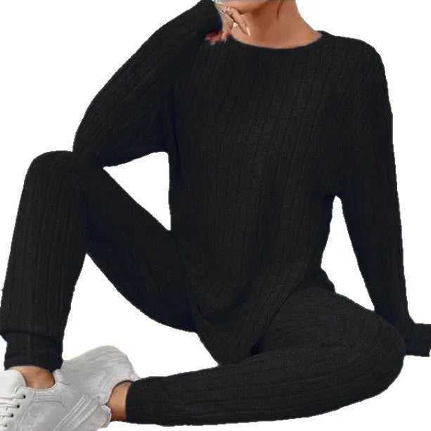 Women's black sunken stripe polyester two-piece loungewear set with top and pants