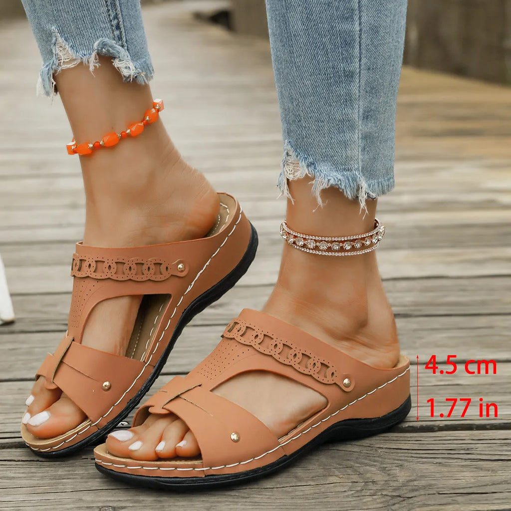 Roman style slippers with slope heel in six colour options showing fish mouth toe holder design