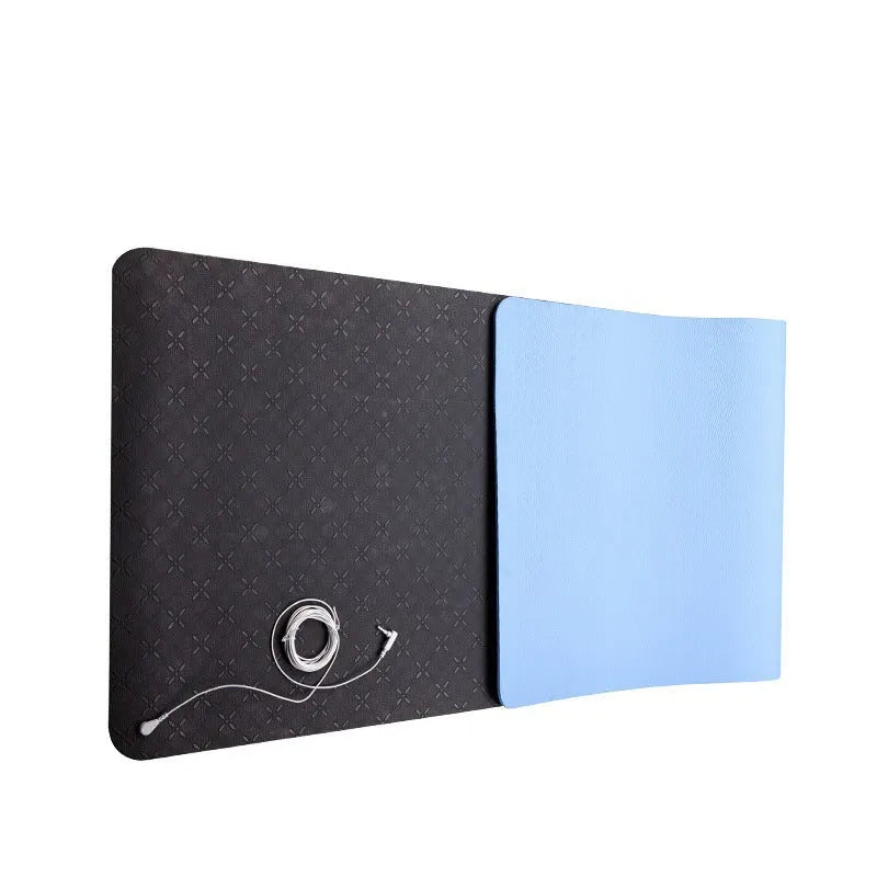 Blue conductive yoga mat with floral pattern, showing grounding wire and non-slip texture, dimensions 182x61cm.