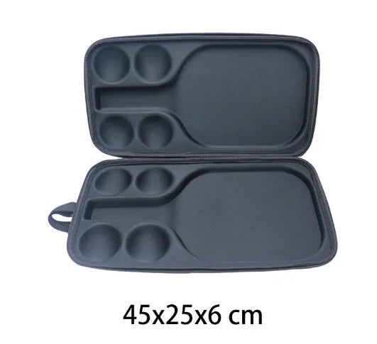 Black pickleball shoulder storage bag with double straps showing one paddle and four balls inside.