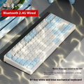 Wireless mechanical keyboard with triple connectivity showing blue and white colour matching design