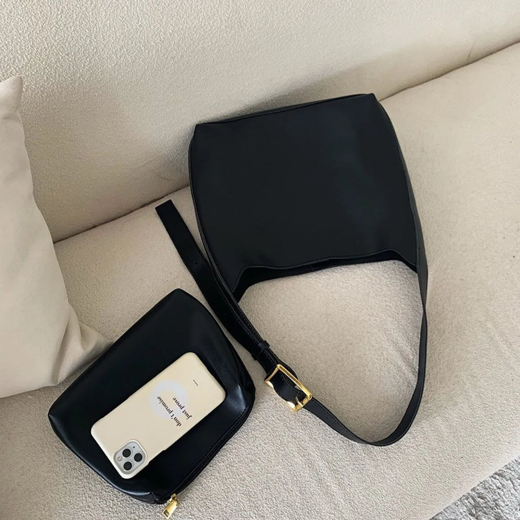 Pair of soft black and brown women's PU shoulder bags with decorative ribbons and swing threads.