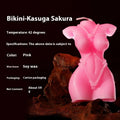 Smsexy Props bikini-shaped soy wax candle in Lilac Purple colour on a table.