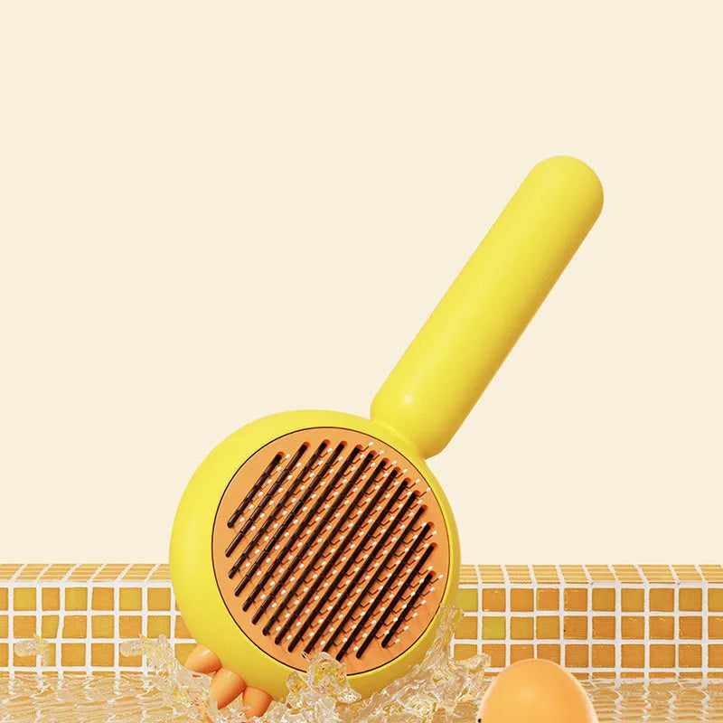 Purple, white, or yellow self-cleaning pet grooming brush with bent stainless steel bristles.