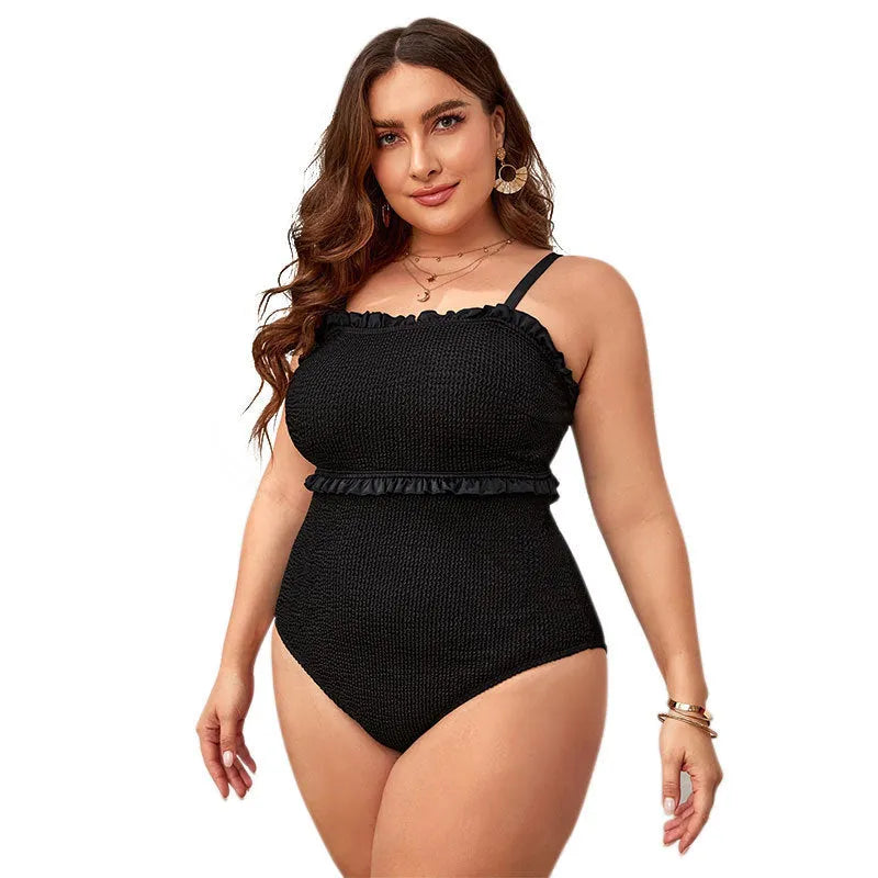 Black plus size bikini with double shoulder straps and siamese belly design on mannequin