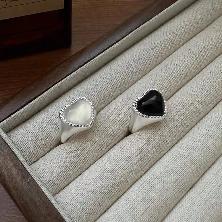 S925 sterling silver adjustable ring with black agate heart stone on finger
