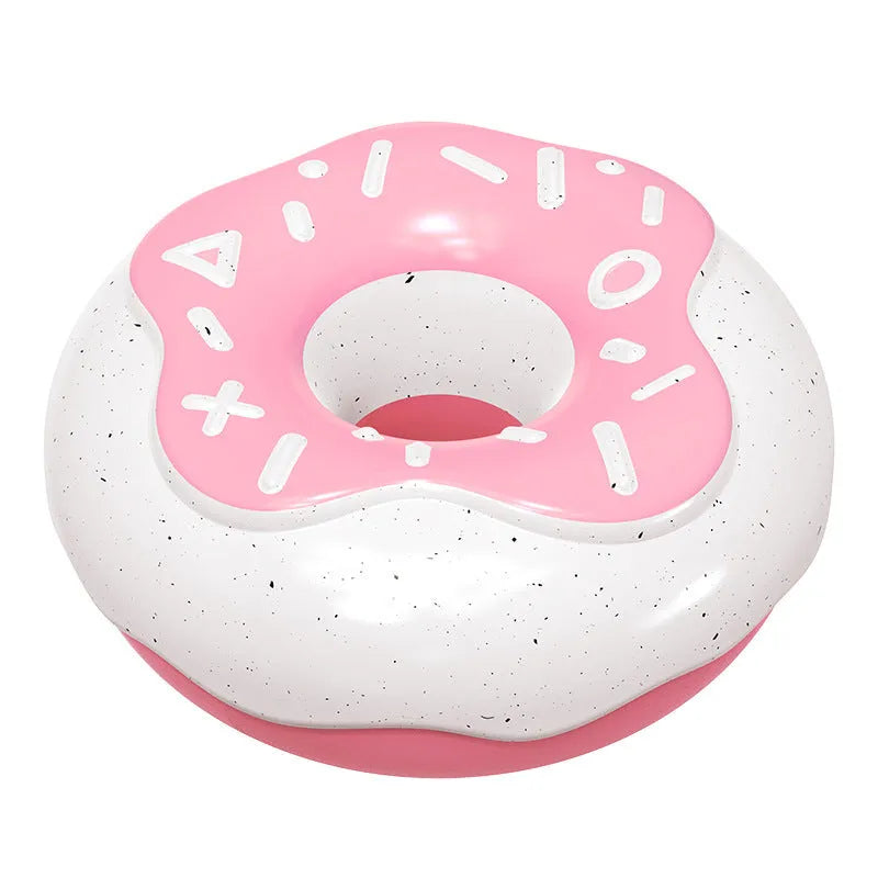 Pink donut-shaped dog chew toy with textured surface for dental cleaning on white background