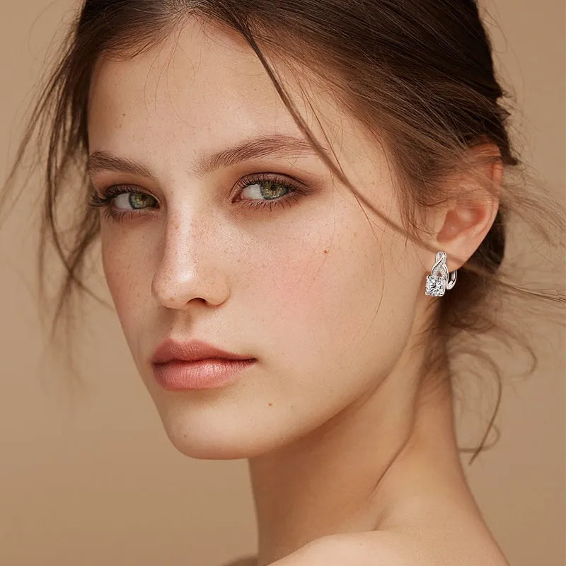 Light luxury moissanite twist drop earrings in 925 silver with gold finish