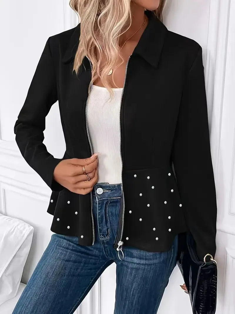 Women's black loose fit coat with heavy-duty zipper and ruffle hem, made from spandex blend fabric.