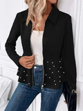 Women's black loose fit coat with heavy-duty zipper and ruffle hem, made from spandex blend fabric.