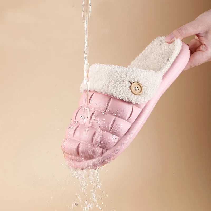 Women's pink and grey plaid detachable slippers with plush lining and a textured non-slip sole.