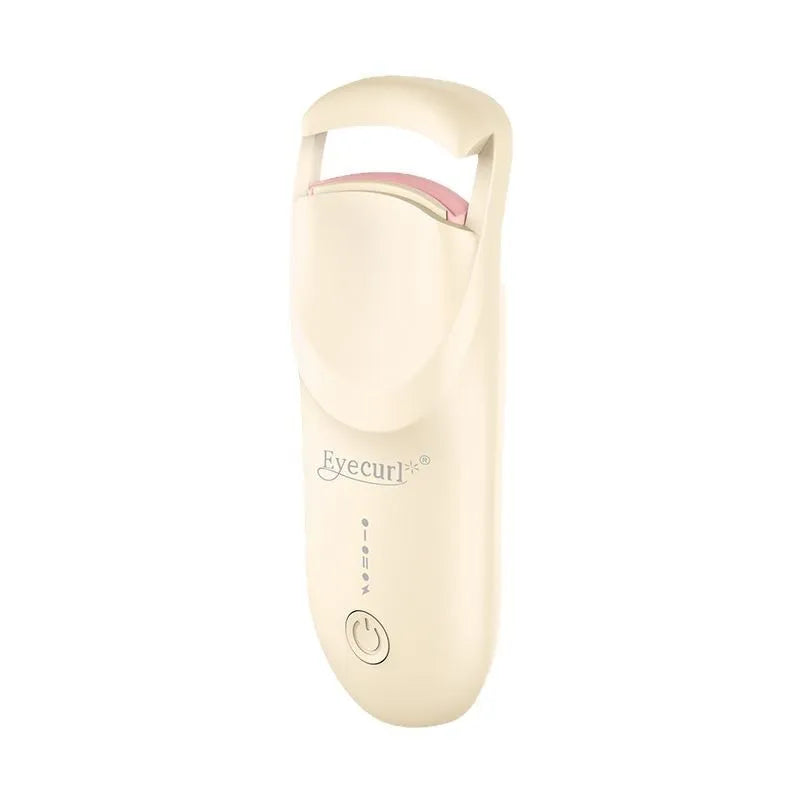 Electric eyelash curler with USB charging cable in cream white colour showing curling mechanism
