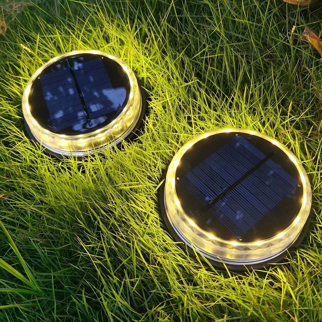 Solar buried light with 17 LED 2835 chips and polycrystalline panel in outdoor lawn setting