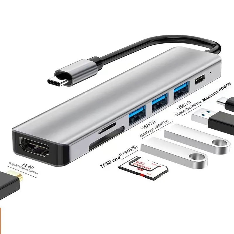 USB-C 7-in-1 aluminium expansion dock with HDMI port, USB ports, and card slots.