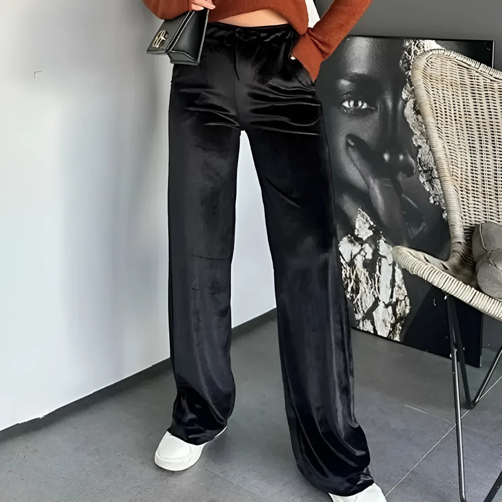 Black shiny velvet high waist drawstring straight leg casual pants on model showing full length