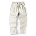 Milky white wide-leg antibacterial cotton trousers shown flat lay