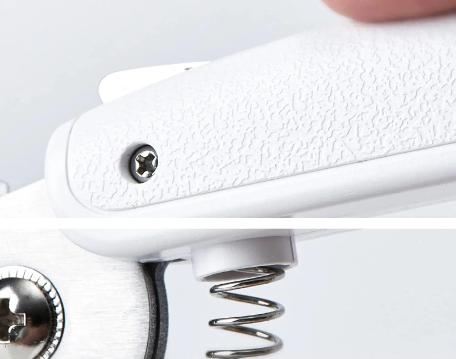 White pet nail clippers with LED light, transparent guard, and a separate nail file on a plain background.