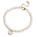 Women's freshwater pearl bracelet with fan-shaped shell design on 16cm elastic or extension chain