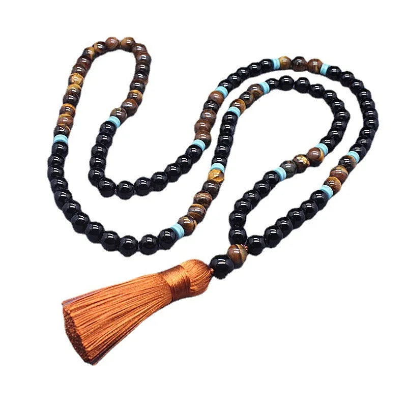 Geometric agate jewellery set with black bracelet and tiger-eye necklace