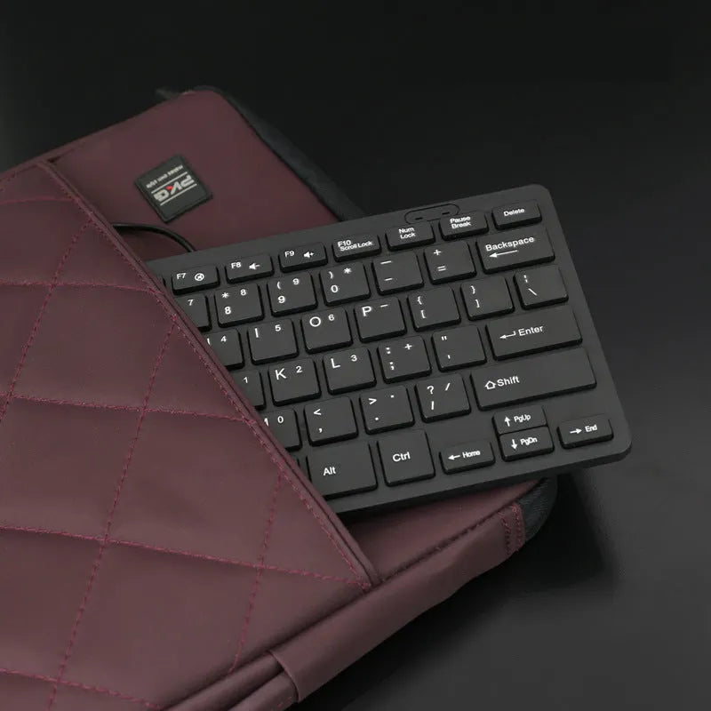 Compact USB wired keyboard with noiseless keys in four colour options